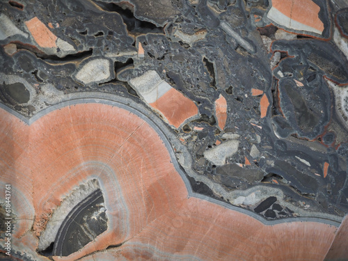 gray and pink sedimentary mineralised limestone breccia stone te photo