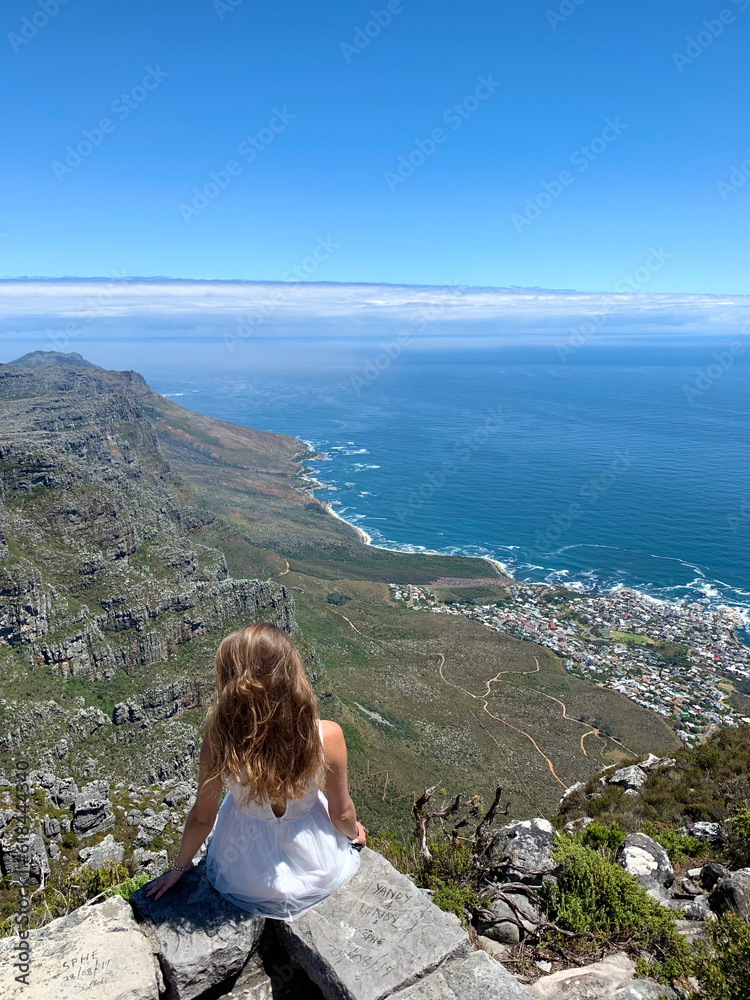 person on the top of a table mountain