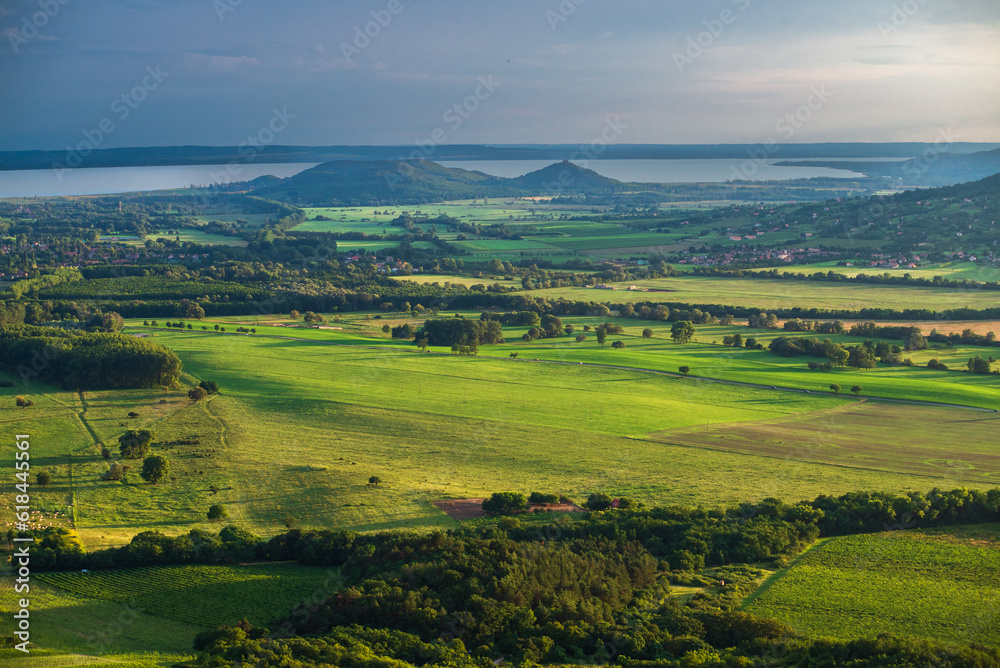 View Szigliget from Csobanc in Balaton Highlands. Szigliget Castle with the Lake Balaton in sunset, Hungary