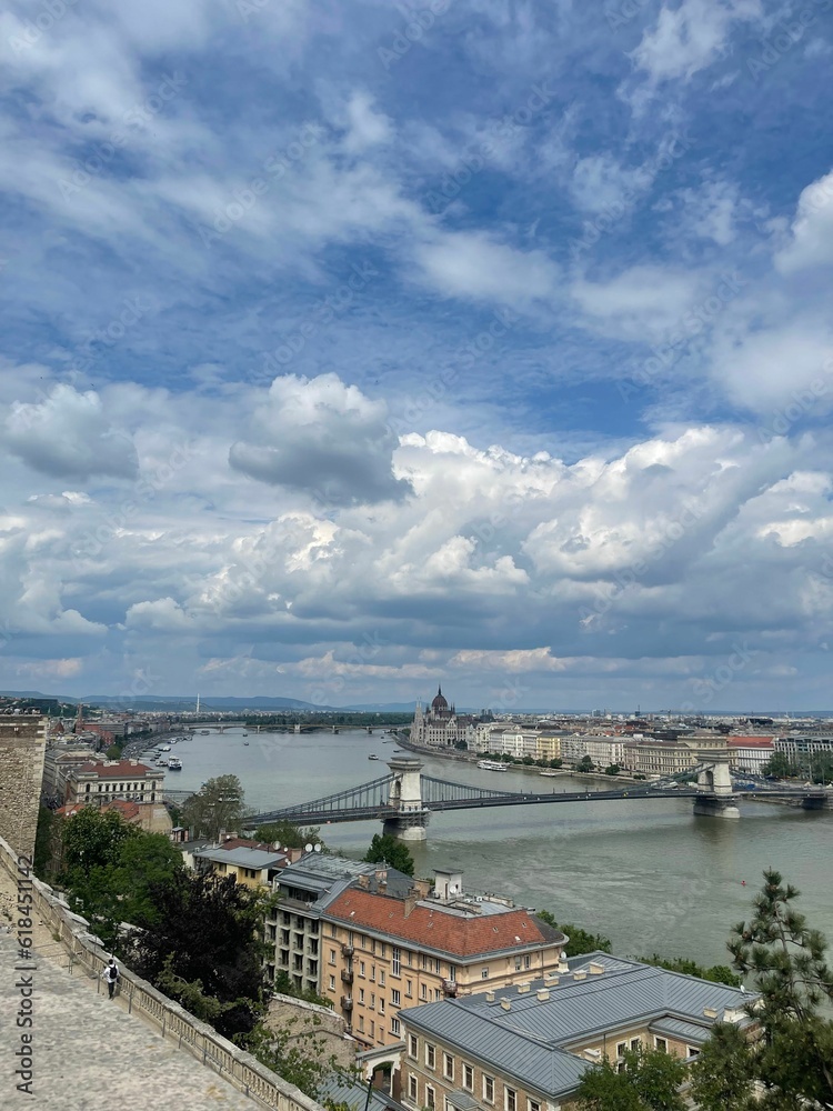 Obraz premium the view from the castle overlooking budapest's old bridge