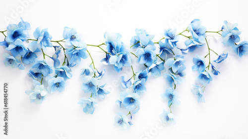 Foto Hanging blue flowers, white background, high detail