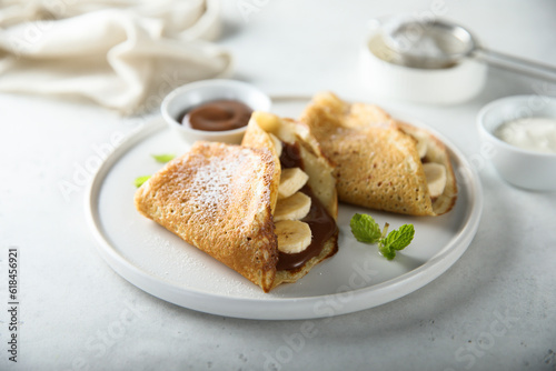 Homemade crepes with chocolate paste