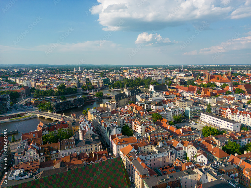 Wroclaw, a city in the Lower Silesian Voivodeship on a sunny day. The most visible tourist places and locations in Wrocław from a bird's eye view from a drone.