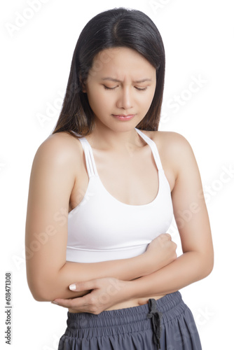 Asian woman suffering from a stomach ache on white background © David Davis