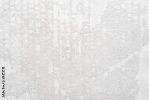 Wet paper texture with wet spots. Sheet of wet paper with surface texture. Paper background