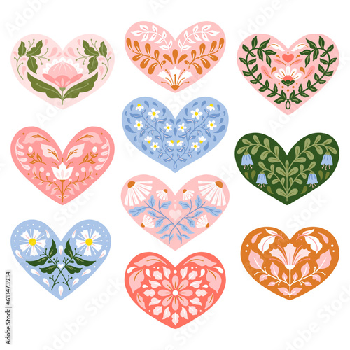 Set of vector illustrated floral hearts in folk art style