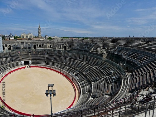 Nîmes, May 2023 : Visit the beautiful city of Nîmes en Provence - Historical city with its arena and ancient theater - View on the arena 