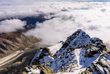 The ridge of the highest Austrian mountain Grossglockner in clouds. 