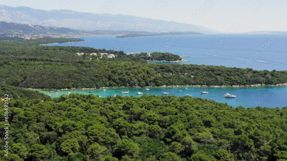 Aerial view of the rocky and forested coast of Rab Island, the Adriatic Sea in Croatia Aerial view of the rocky and forested coast of Rab Island, the Adriatic Sea in Croatia