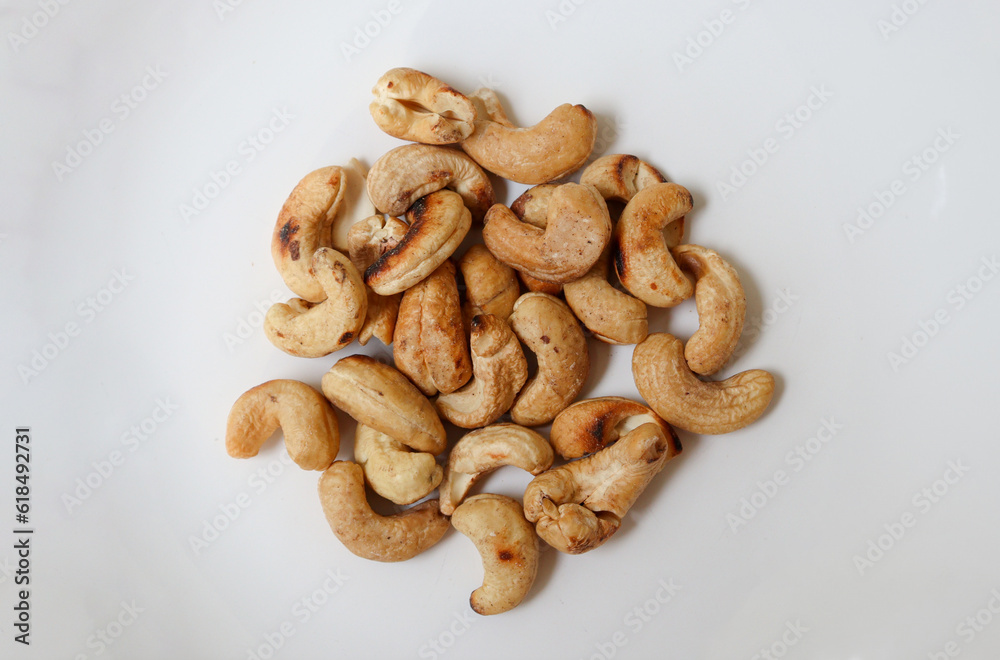 Fototapeta premium Brazilian walnut cashew nuts on white background