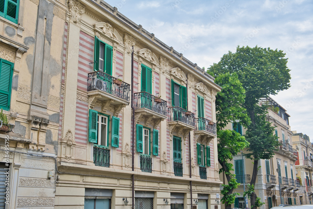 typical old house facade in messina , sicily in southern italy typical old house facade in messina , sicily in southern italy