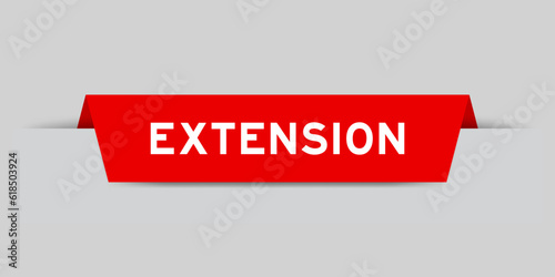 Red color inserted label with word extension on gray background