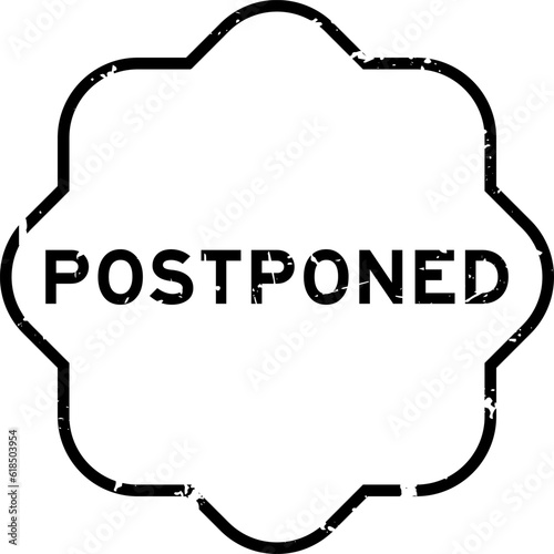 Grunge black postponed word rubber seal stamp on white background