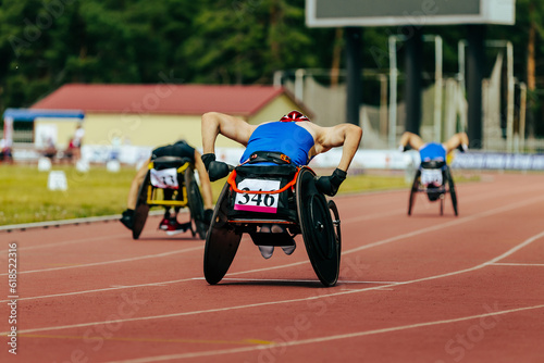 group athletes in wheelchair racing race track stadium in para athletics championship, summer sports games