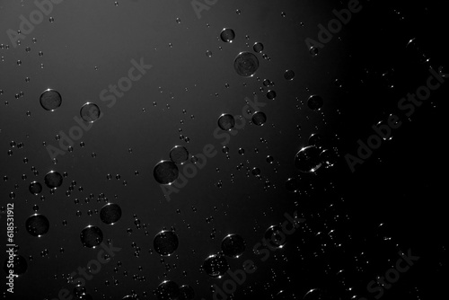 Soap bubbles on the dark background