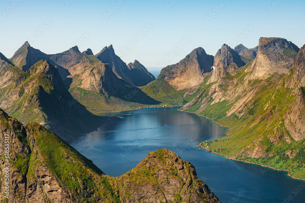 View of a fjord Kjerkfjorden near village Reine from Reinebringen with dramatic mountains and peaks and sea, Lofoten islands, Nordland, Norway. One of the most beautiful view of Lofoten islands.