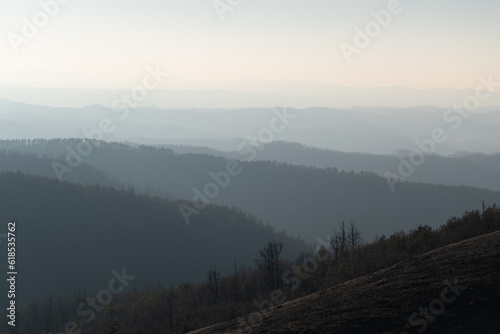 Landscape of mountain layers in haze  fading in distance  view from mountain Ljubic near Prnjavor