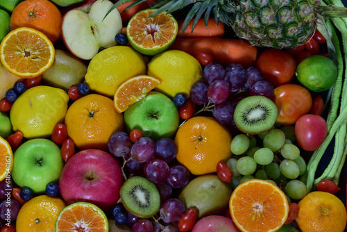 Fresh fruits  assorted fruits  colorful background. Healthy fruits and vegetables concept.