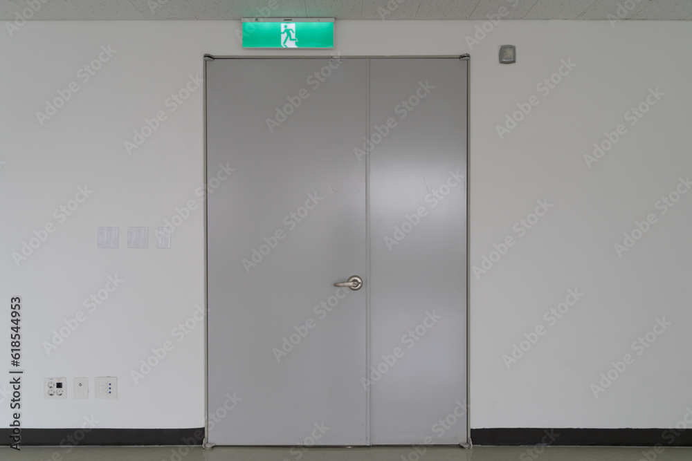 Entrance door seen from inside an empty office Entrance door seen from inside an empty office