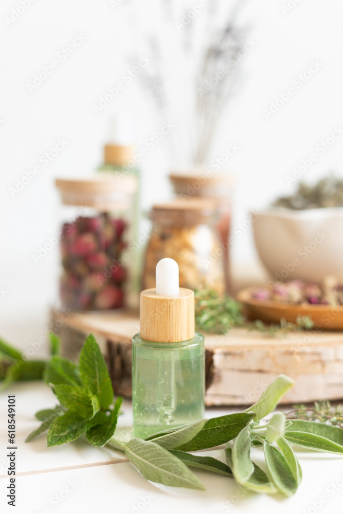 Botanical blends, herbs, essencial oils for naturopathy. Natural remedy, herbal medicine, blends for bath and tea on wooden table background Botanical blends, herbs, essencial oils for naturopathy. Natural remedy, herbal medicine, blends for bath and tea on wooden table background