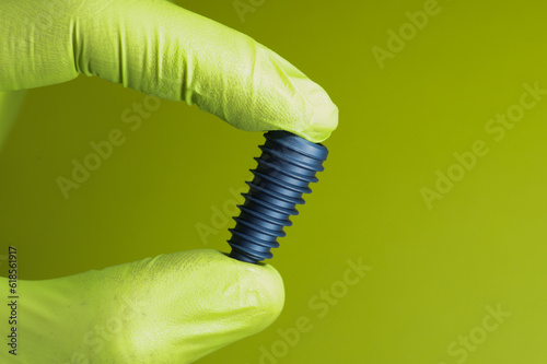 implant on green background  