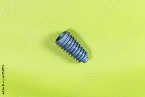 implant on green background ,