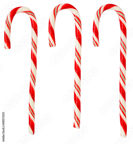Red and white candy canes isolated on a white background.