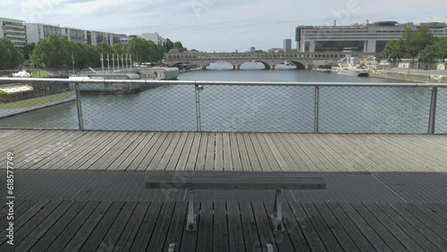 Old French bridge in Paris over the river