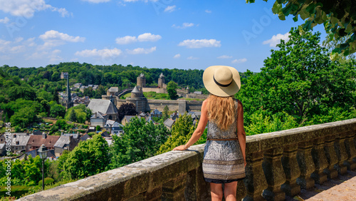 Rear view of woman tourist in Fougeres city- Brittany in France