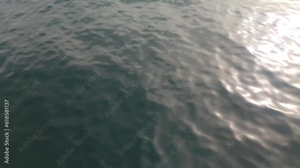 Dramatic Water Reflections and Sunlight Patterns Captured in High Resolution Video Over Ocean Surface Dramatic Water Reflections and Sunlight Patterns Captured in High Resolution Video Over Ocean Surface