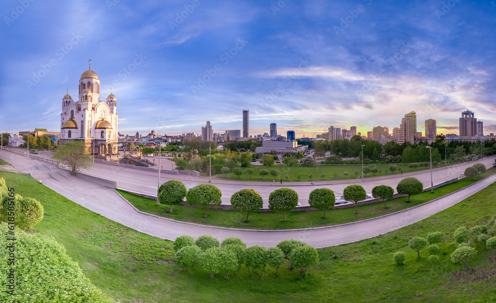 Summer Yekaterinburg and Temple on Blood in beautiful clear sunset.. Aerial view of Yekaterinburg, Russia. Translation of the text on the temple: Honest to the Lord is the death of His saints.