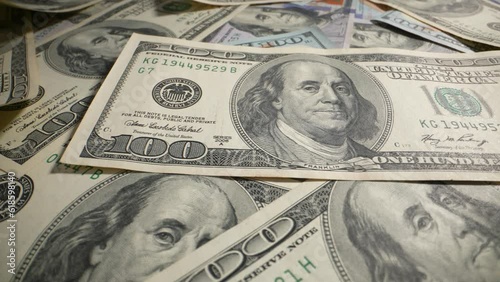 100 dollar bills on the table close-up