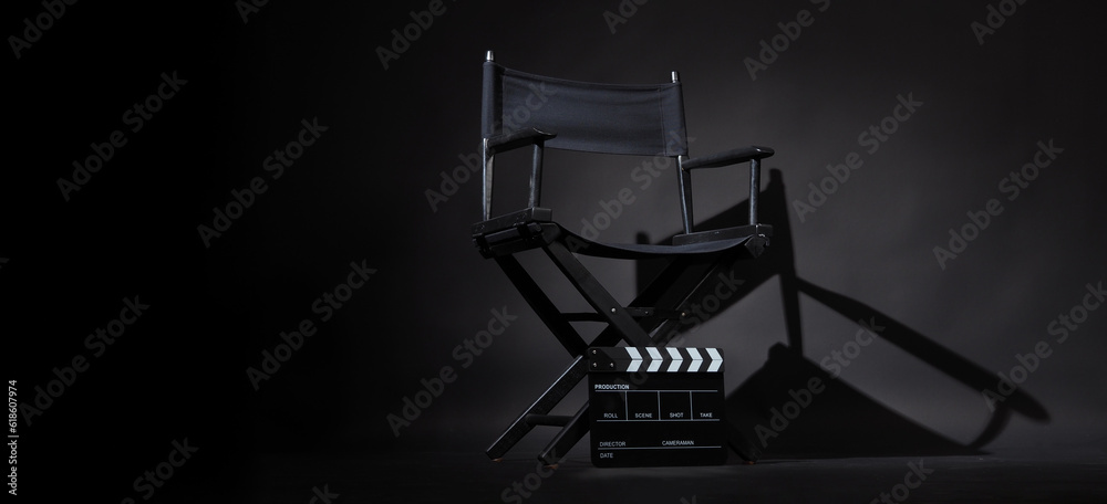 Black director chair and Clapper board or slate on black background. Black director chair and Clapper board or slate on black background.