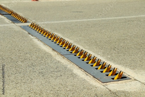 Obraz na plátně Road blocker studs, studs for one-way traffic