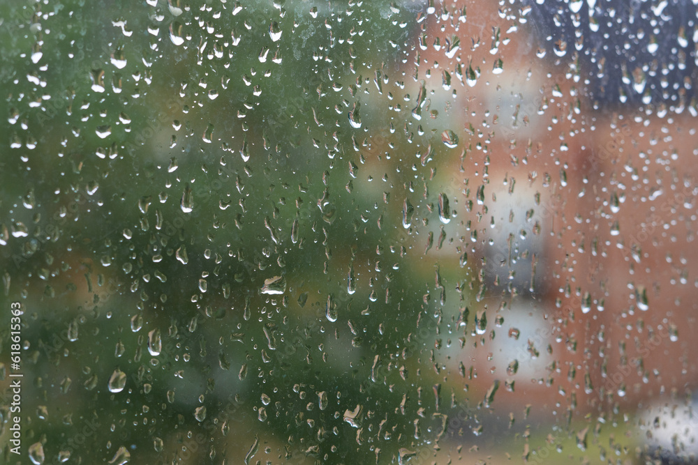 drops of rain on the window ,wet weather