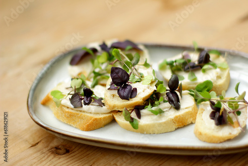 mini sandwiches with micro-greens, a light snack of bread, cheese and basil