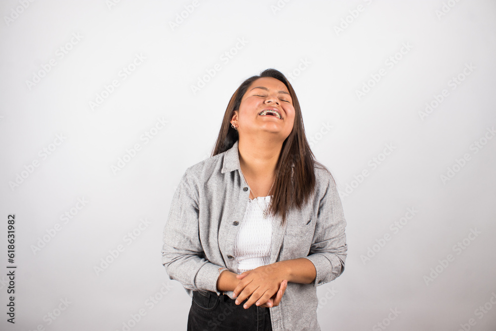 Latin woman photograph smiling and enjoying herself. Concept of mental health, women and personal care. Latin woman photograph smiling and enjoying herself. Concept of mental health, women and personal care.