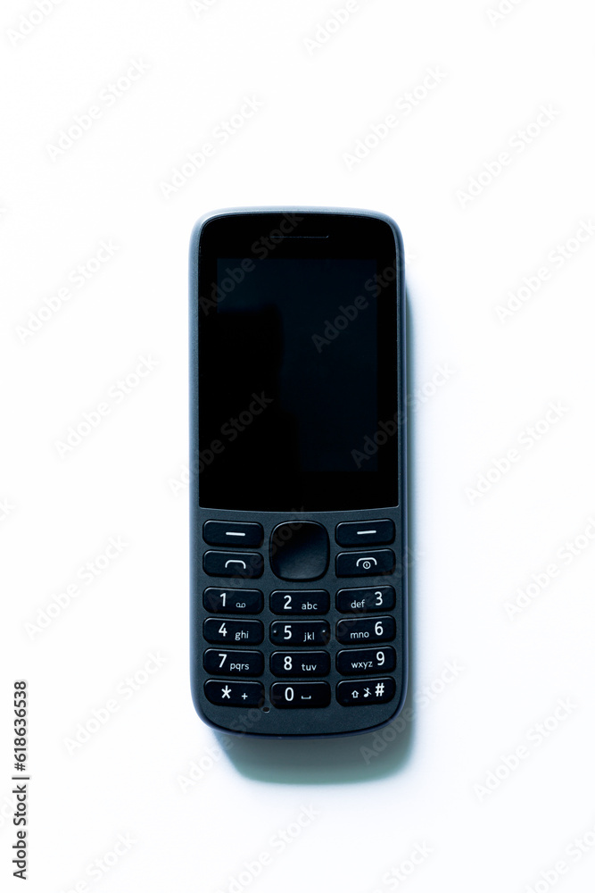 push button phone isolated white background,Small Old Black Mobile Phone - On White Background push button phone isolated white background,Small Old Black Mobile Phone - On White Background