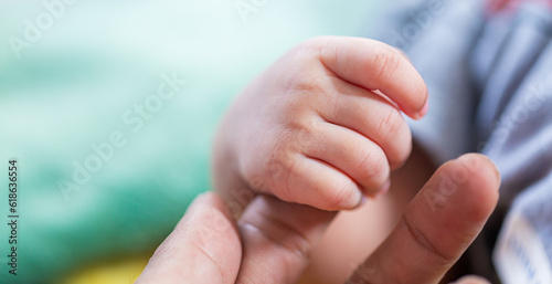 Baby hand,Newborn baby hand in mother hand, mother and her baby, happy family concept, beautiful conception image of childbirth.  photo