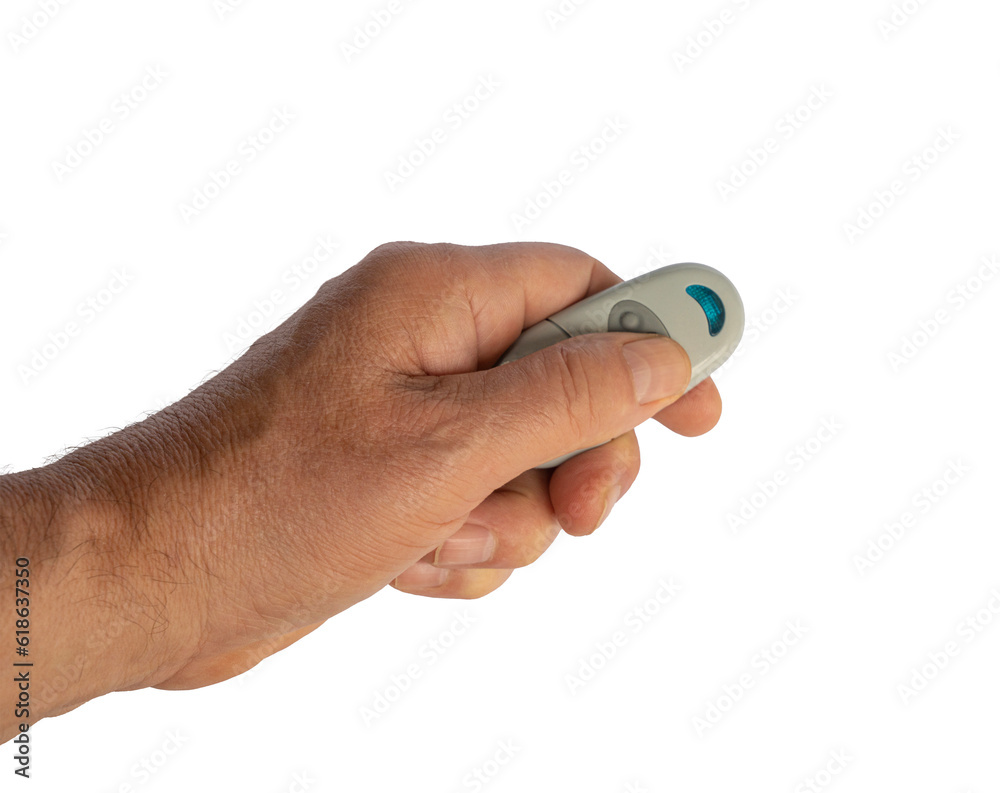 a male hand with the remote control isolated a male hand with the remote control isolated
