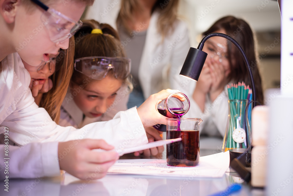 Kids in the school working on an experiment at the Science Lab Kids in the school working on an experiment at the Science Lab