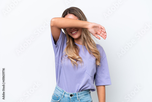 Young Uruguayan woman isolated on white background covering eyes by hands