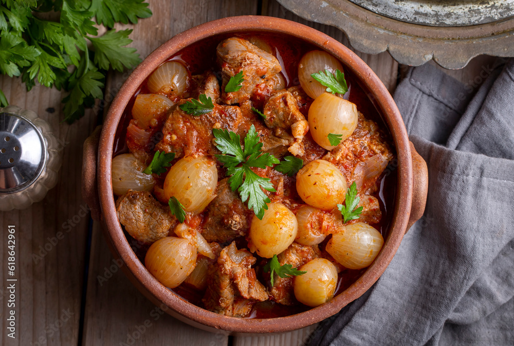 Traditional Greek dish of beef stifado in a sauce. Meat stew, onion stew. Turkish name; sogan yahni or et yahni