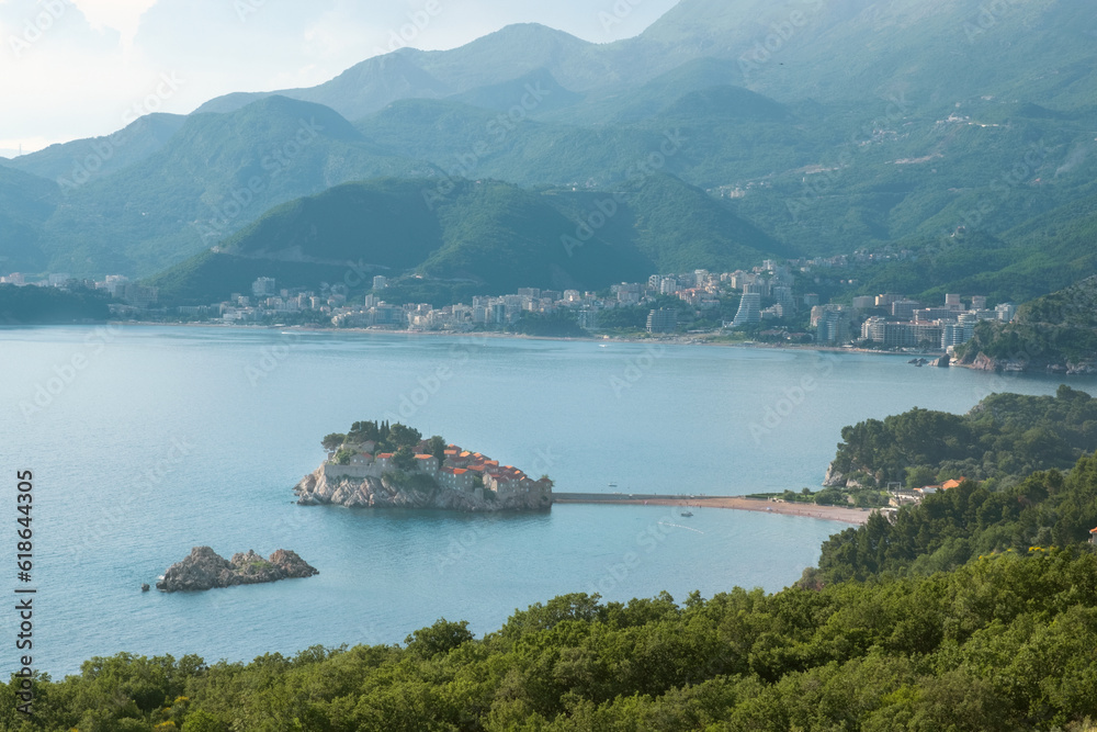 A wonderful point of interest from the mountain to the island of Sveti Stefan in Montenegro in the Adriatic Sea.