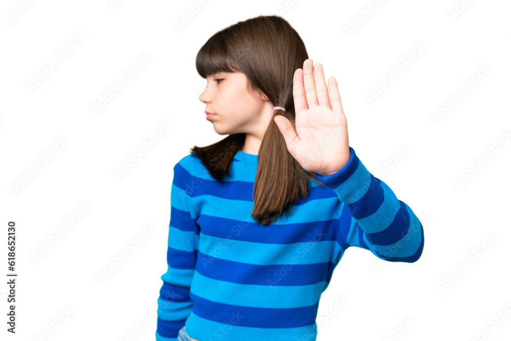 Little caucasian girl over isolated background making stop gesture and disappointed Little caucasian girl over isolated background making stop gesture and disappointed