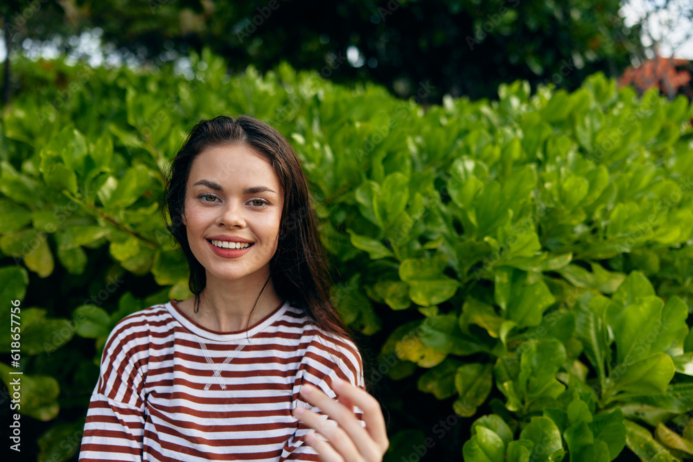woman beautiful smiling summer lifestyle striped walk t-shirt park nature freedom woman beautiful smiling summer lifestyle striped walk t-shirt park nature freedom
