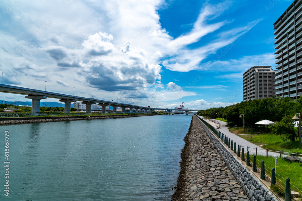 buildings and urban expressway are stand near by sea in Fukuoka city, JAPAN. buildings and urban expressway are stand near by sea in Fukuoka city, JAPAN.