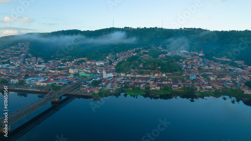 City ​​of San Felix on the banks of the Paraguaçu River. São Félix.  With mountains and fog in the background. São Félix has its origin in a Tupinamba village photo