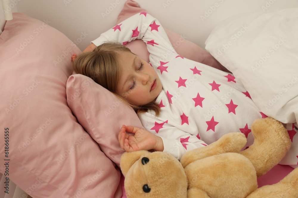 Little girl snoring while sleeping in bed Little girl snoring while sleeping in bed