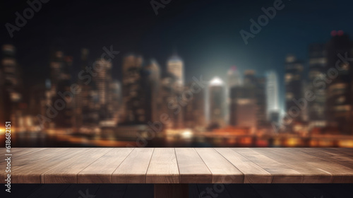Empty dark table top and blur night view of the city © tashechka